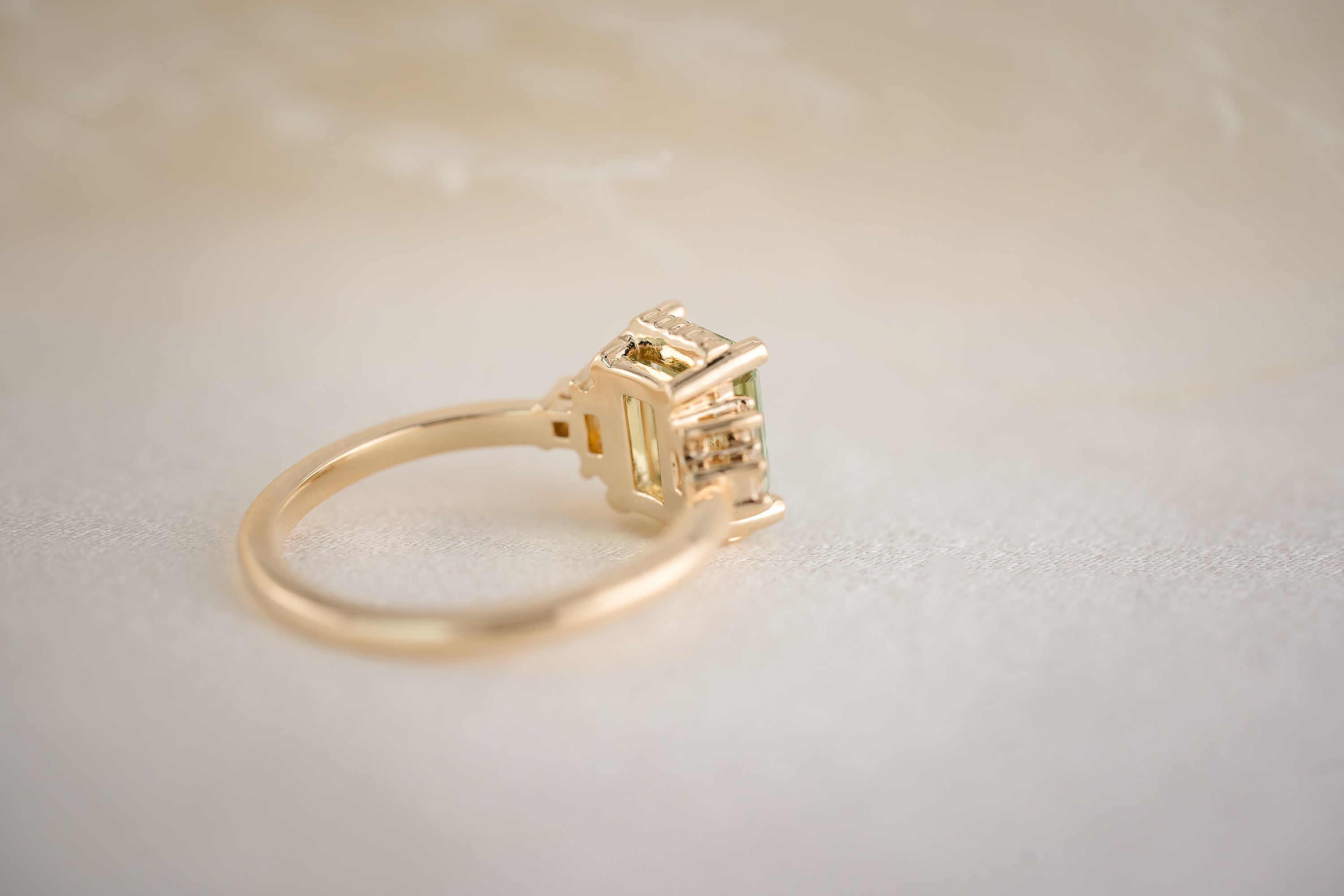 The Sura 1.81 CT Emerald Cut Green Garnet Ring - Lavender Creek Gems