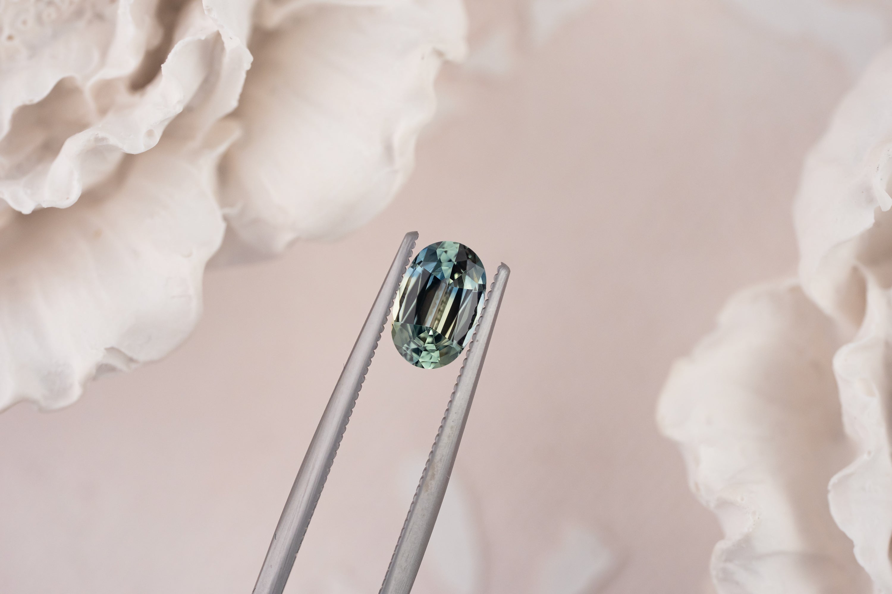 0.94 CT Oval Bicolor Teal Sapphire - Lavender Creek Gems