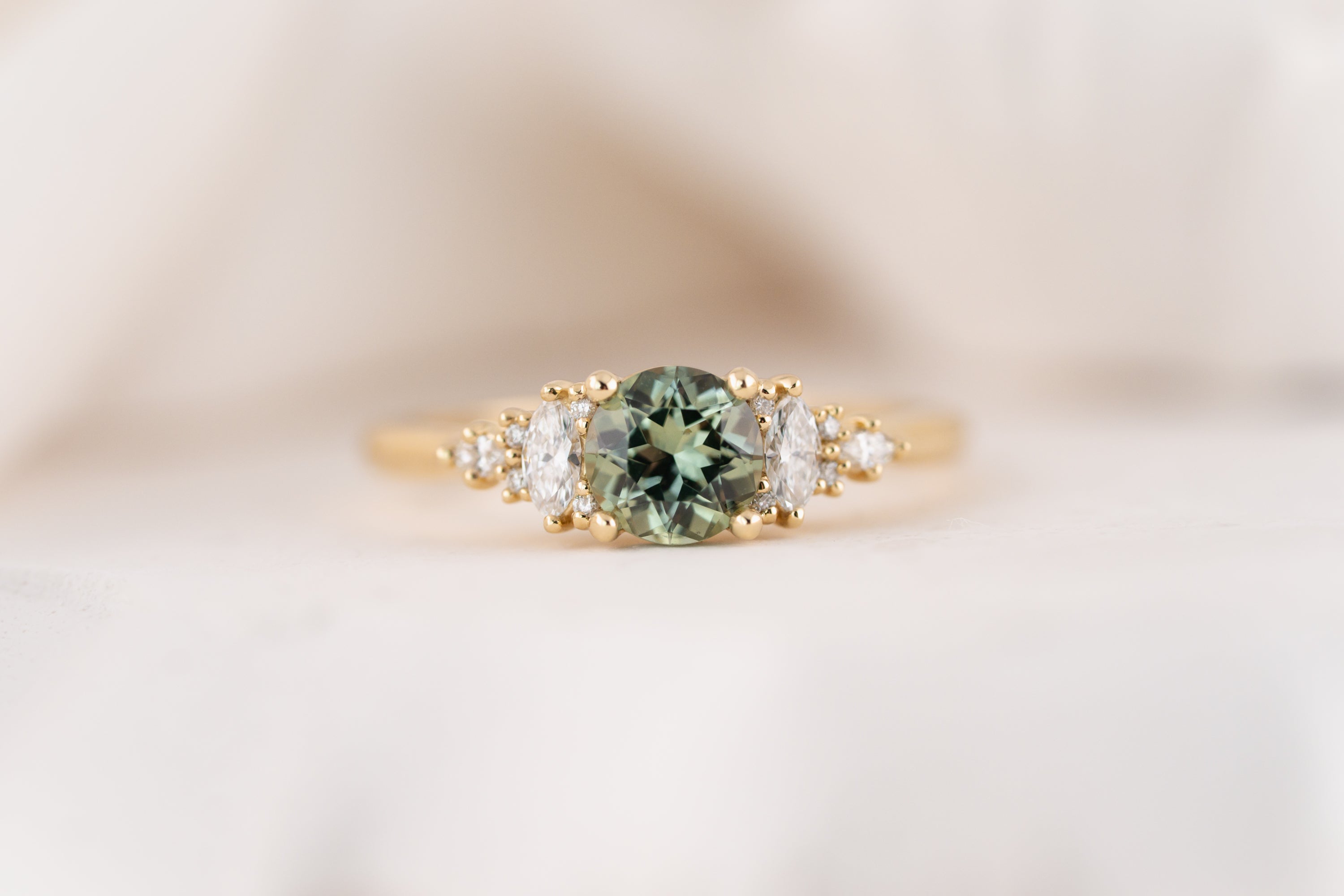 The Maeve Ring | 0.88 CT Round Teal Green Montana Sapphire