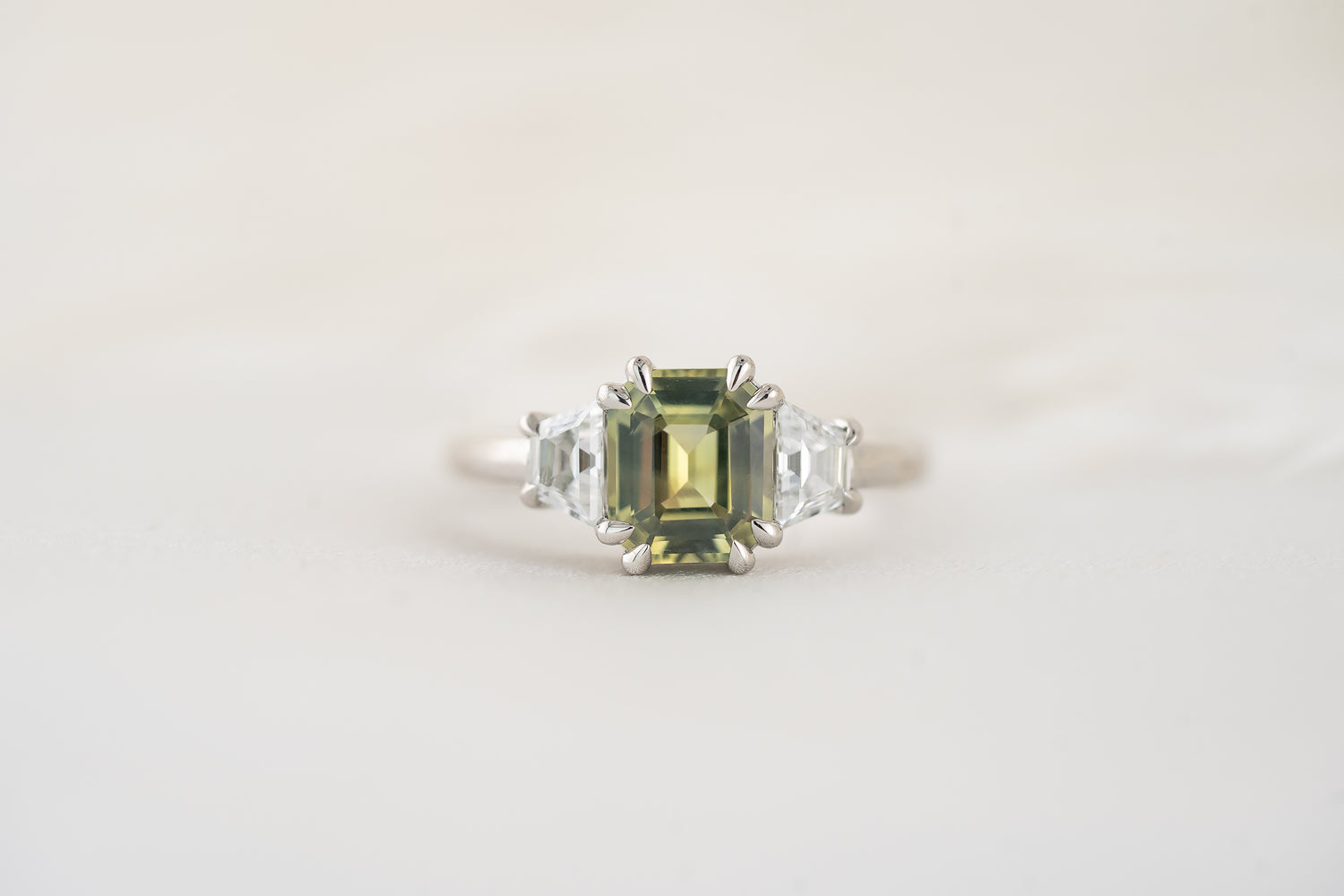 The Tría Ring | 1.9 CT Emerald Cut Green Sapphire - Lavender Creek Gems