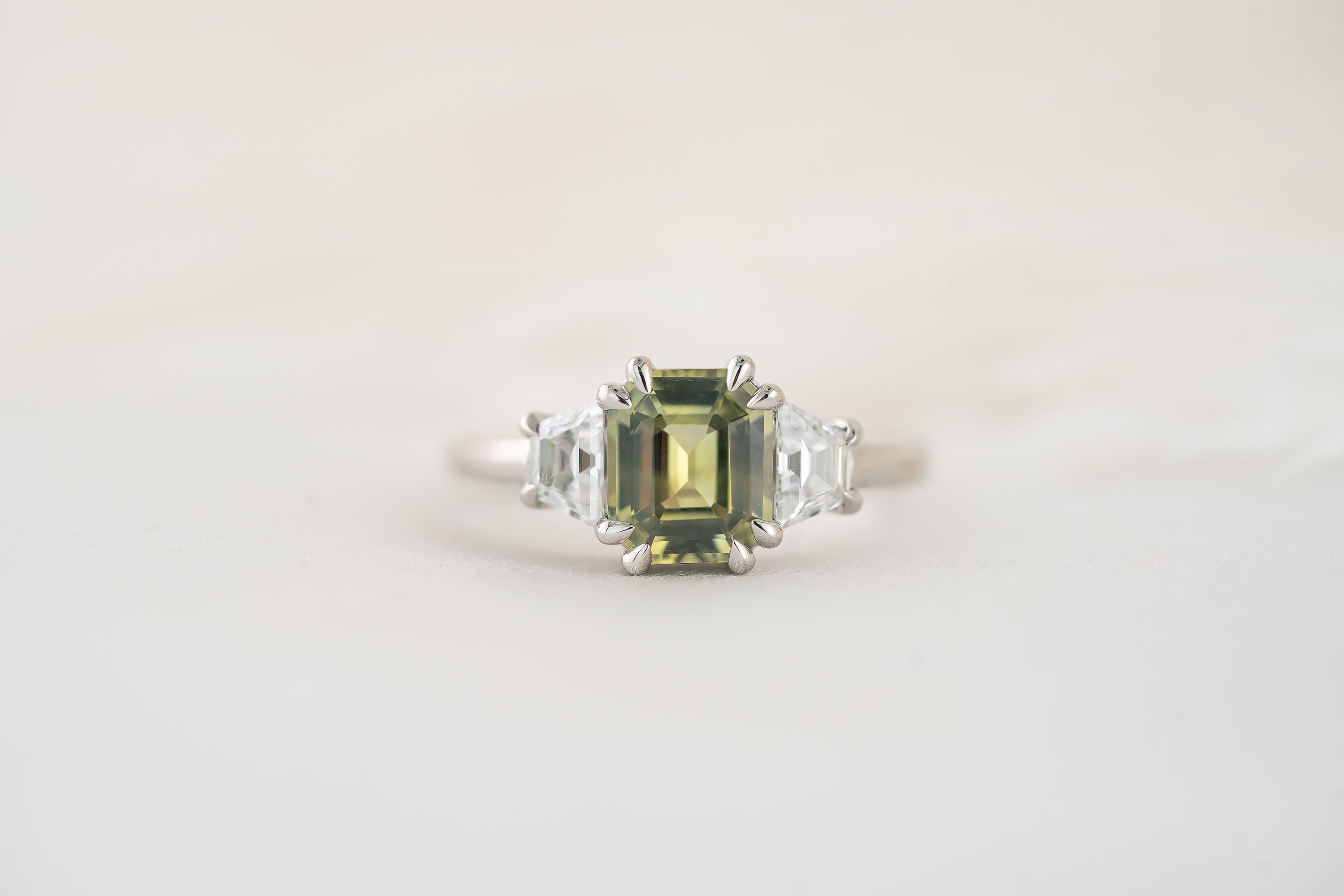 The Tría Ring | 1.9 CT Emerald Cut Green Sapphire - Lavender Creek Gems