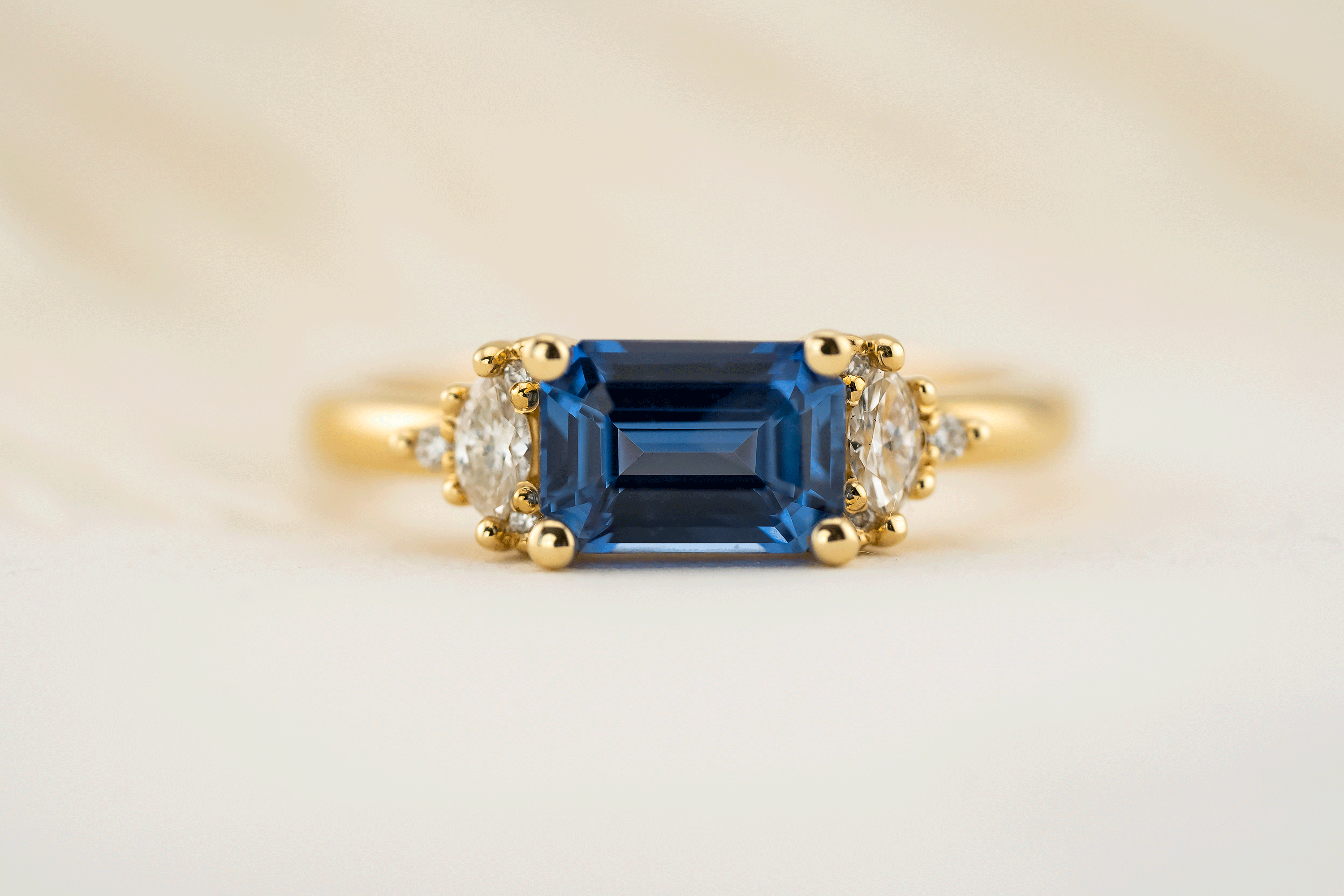 The Low Maren Ring | 1.6 CT Emerald Cut Blue Sapphire - east/west - Lavender Creek Gems