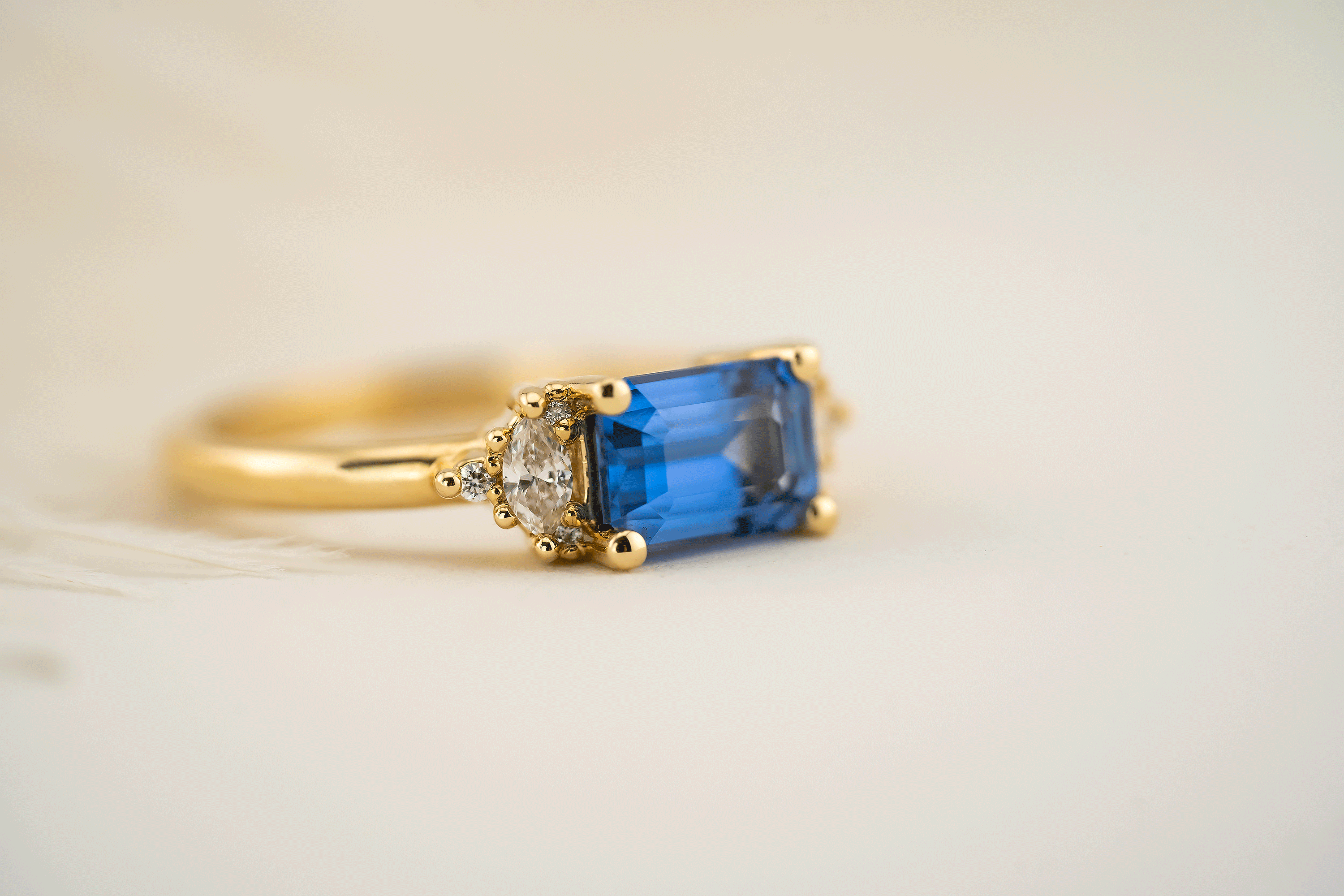 The Low Maren Ring | 1.6 CT Emerald Cut Blue Sapphire - east/west - Lavender Creek Gems