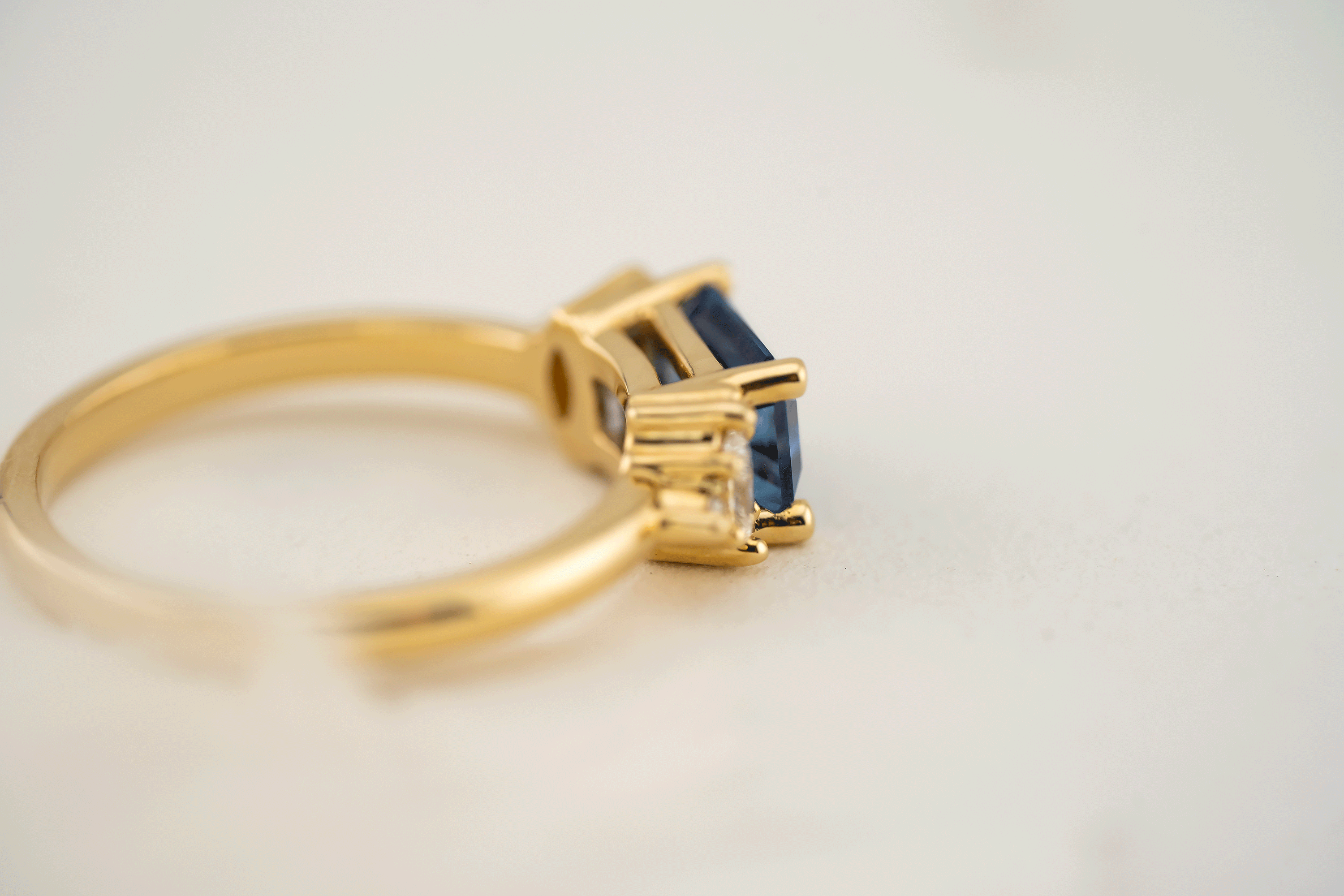 The Low Maren Ring | 1.6 CT Emerald Cut Blue Sapphire - east/west - Lavender Creek Gems