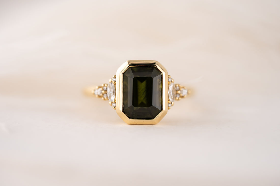 The Bezel Maeve Ring | 3.55 CT Emerald Cut Green Sapphire