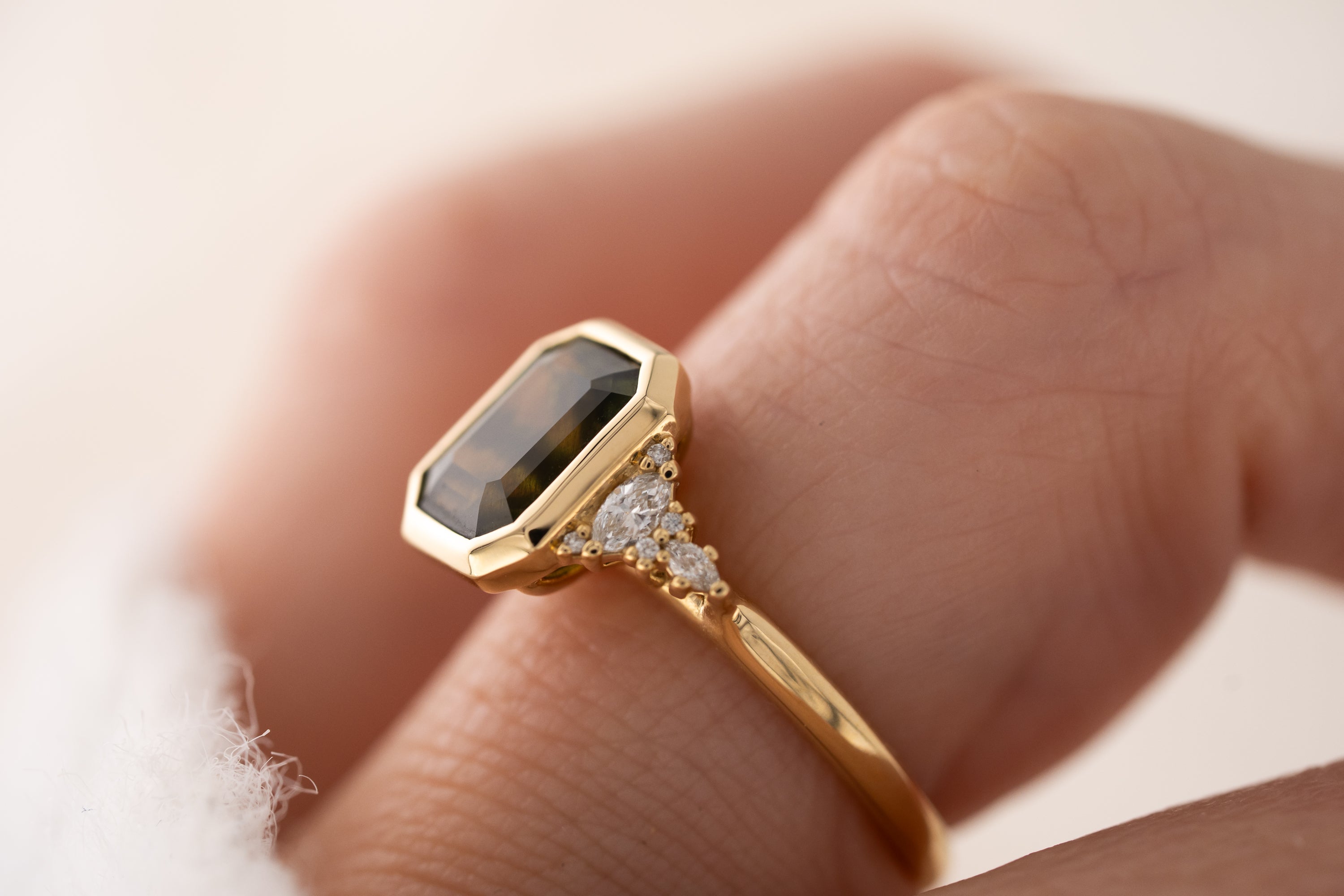 The Bezel Maeve Ring | 3.55 CT Emerald Cut Green Sapphire