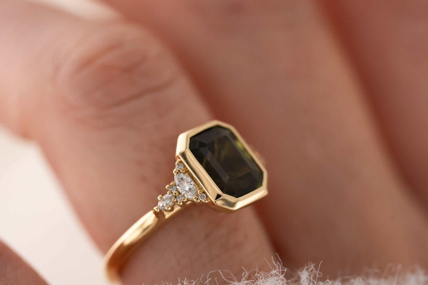 The Bezel Maeve Ring | 3.55 CT Emerald Cut Green Sapphire