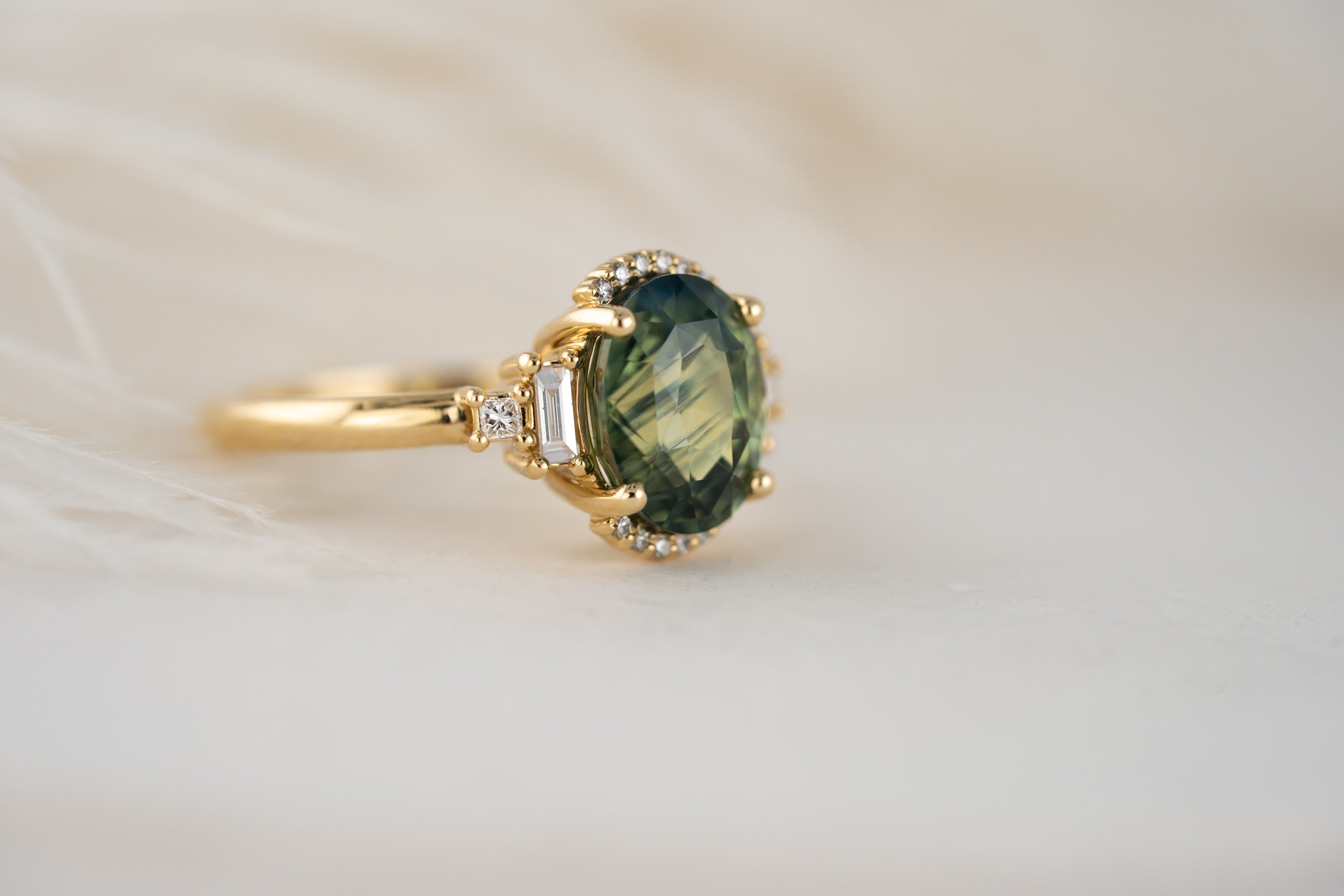The Sura Ring | 3.97 CT Oval Teal Green Sapphire