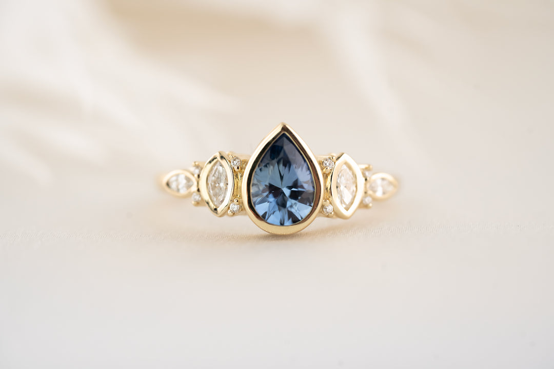 The Bezel Maeve Ring - 0.9 CT Pear Blue Sapphire