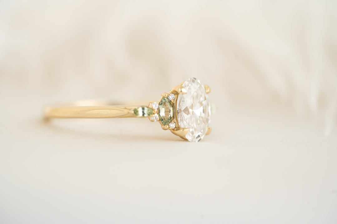 The Maeve Ring - 1.2 CT Oval Diamond + Green Sapphire