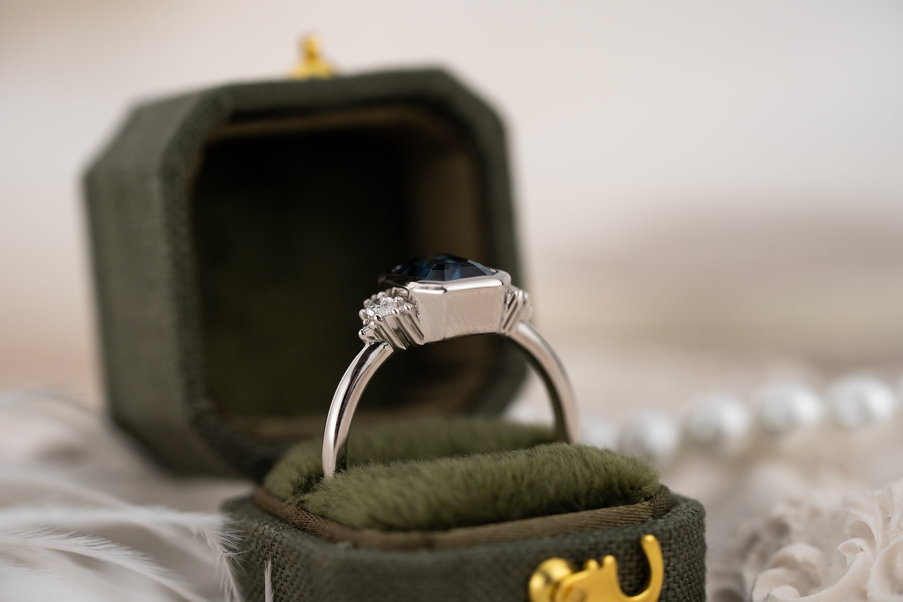 The Low Bezel Maren Ring | 2.22 CT Emerald Cut Bicolor Blue Sapphire