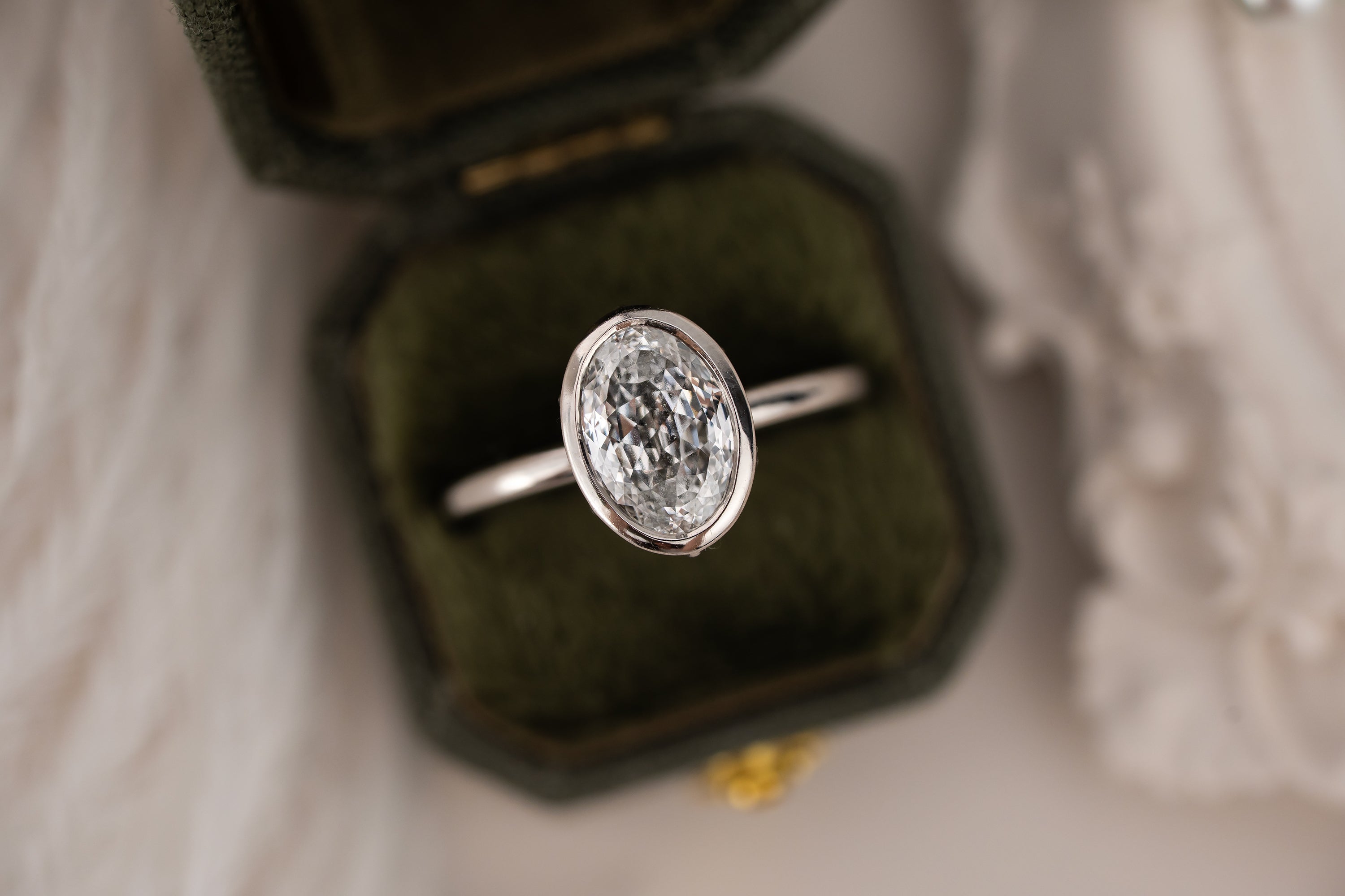 The Bezel Secret Garden Ring | 2.09 CT Portuguese Cut Oval Diamond
