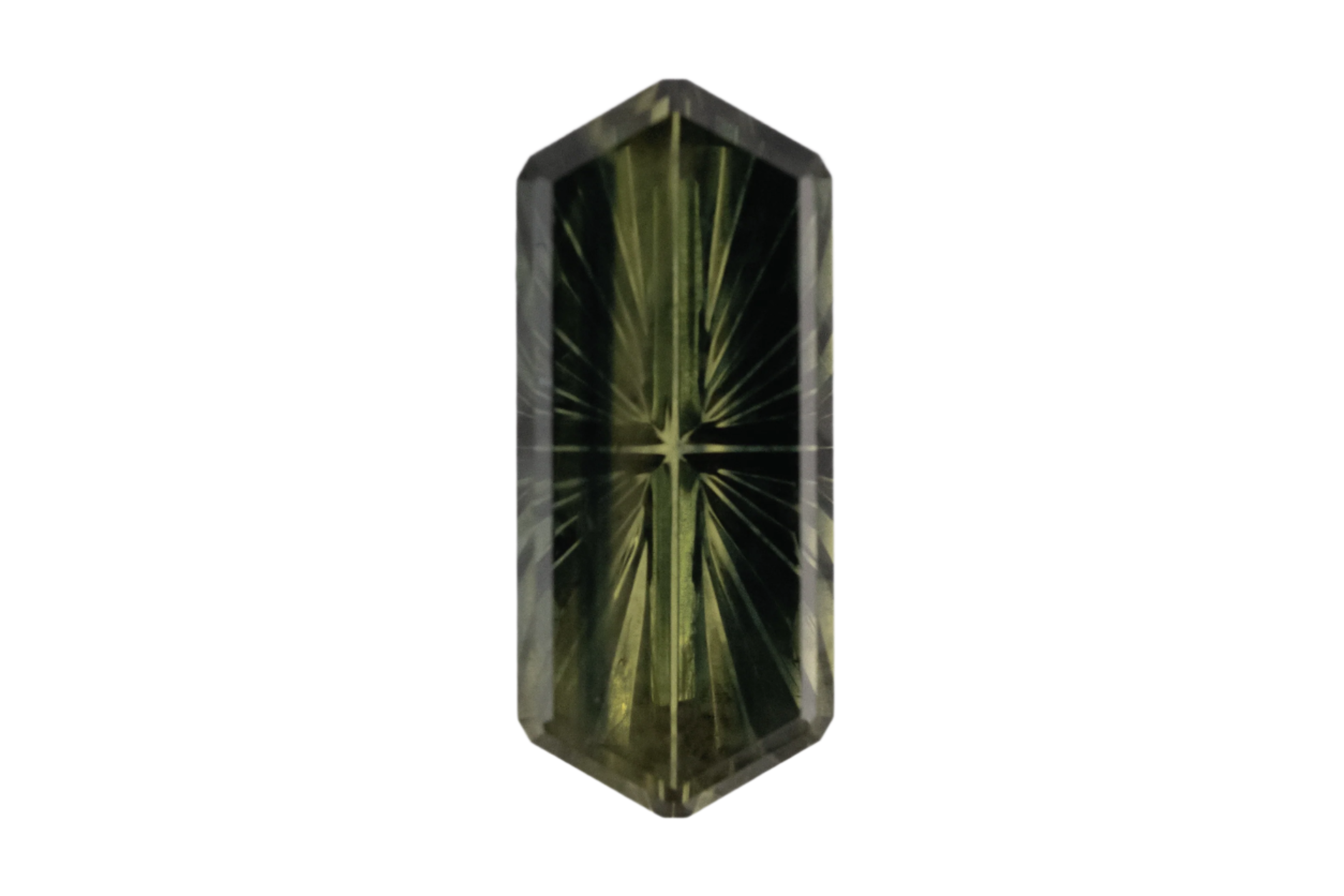 Faceted green gemstone on a white background