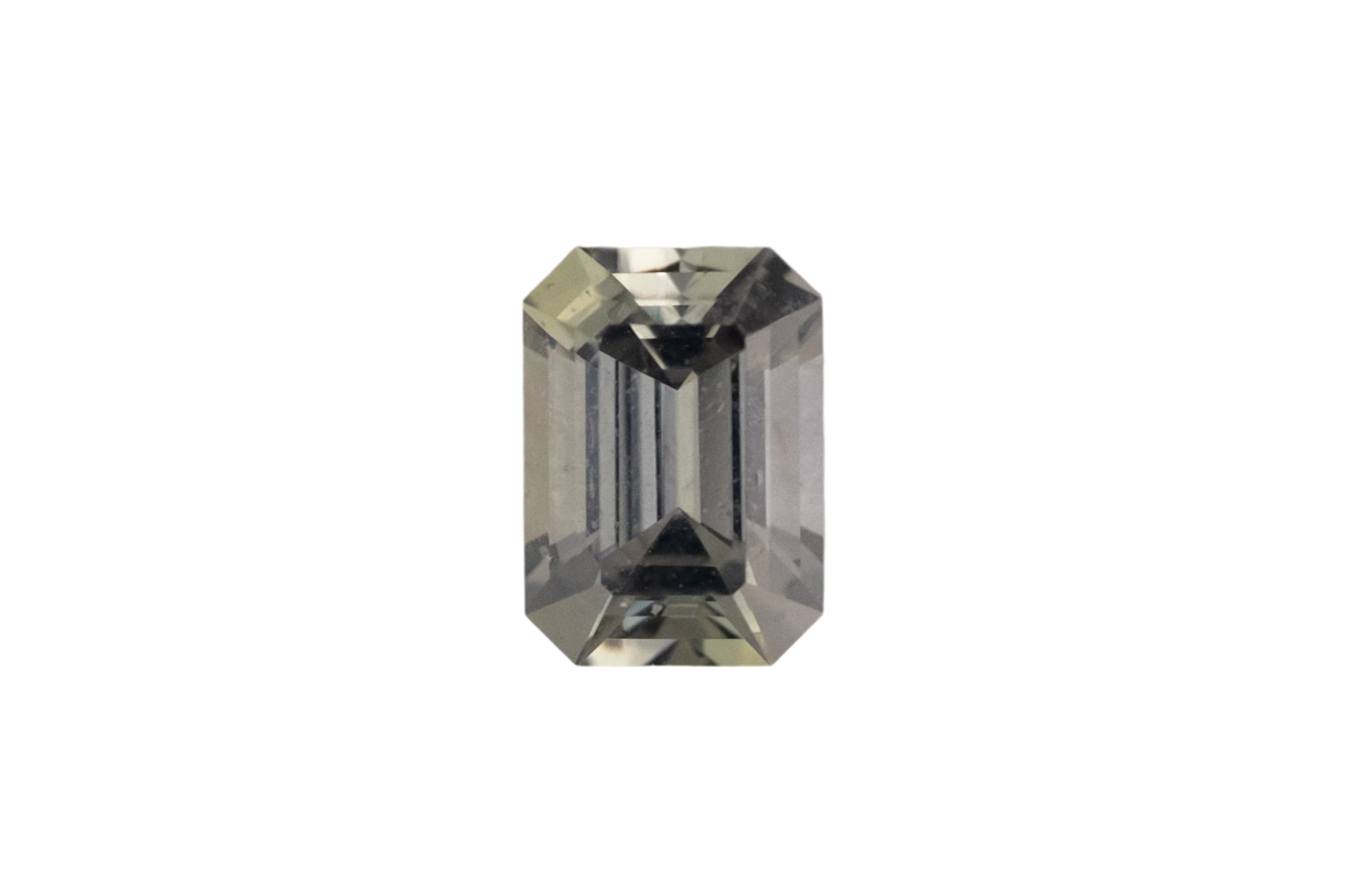 0.67 CT Emerald Cut Pale Green Sapphire - Lavender Creek Gems