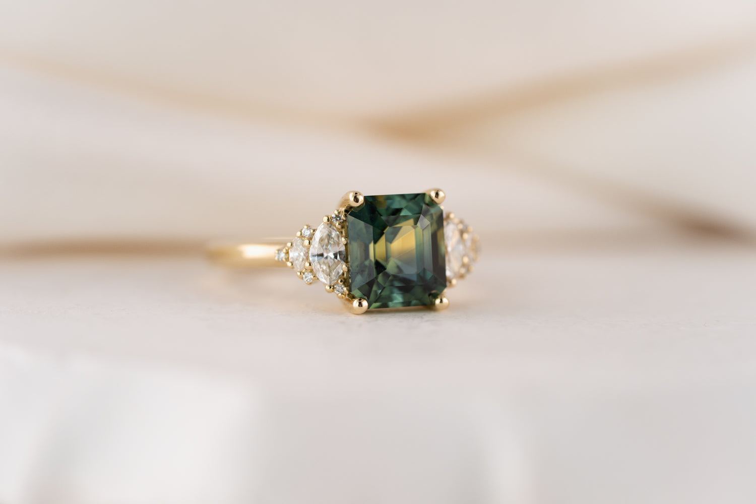 The Vivienne Ring | 3.54 CT Emerald Cut Teal Parti Sapphire - Lavender Creek Gems