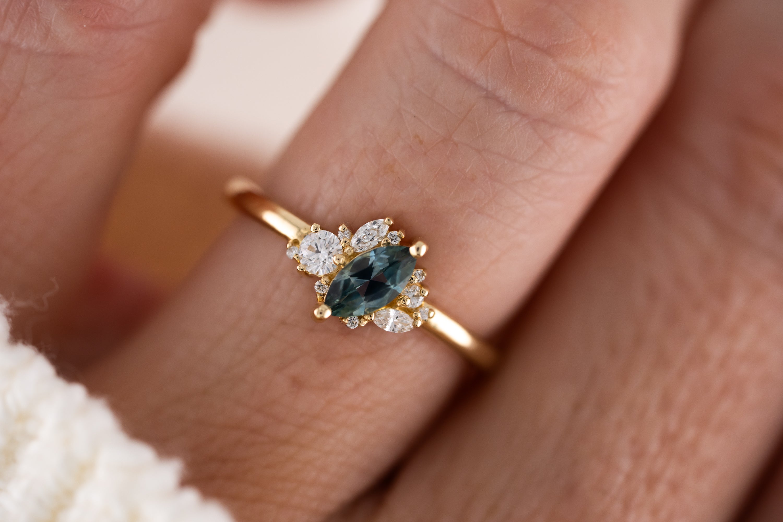 The Cosma Ring | 0.38 CT Marquise Montana Sapphire