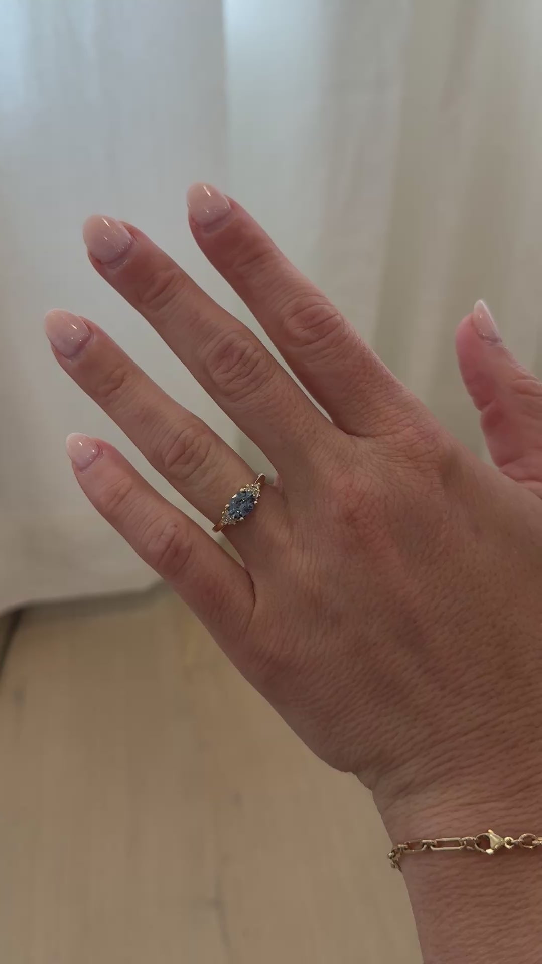 The Low Maren Ring | 1.23 CT Blue Oval Sapphire - east/west