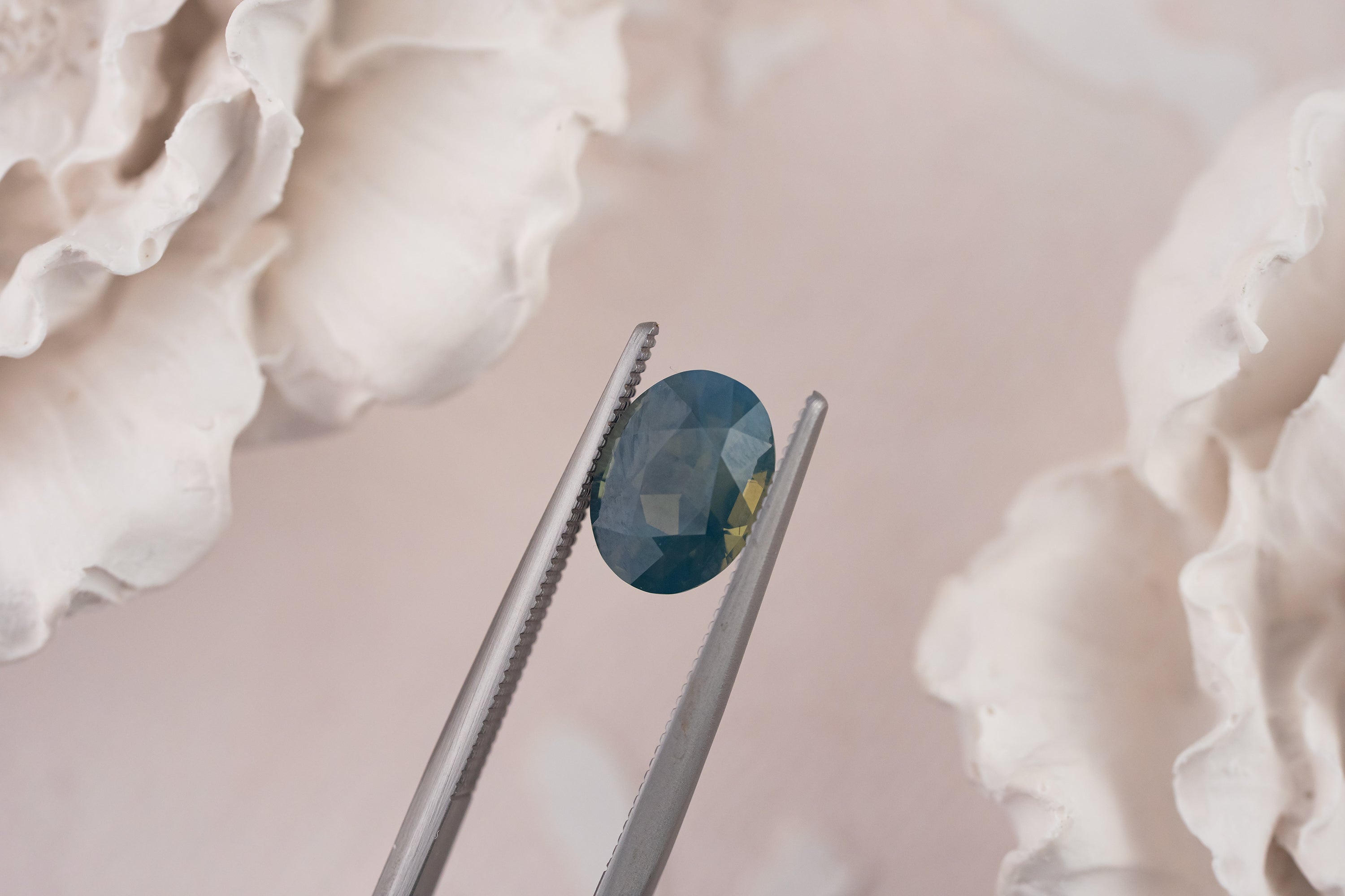 2.04 CT Oval Opalescent Teal Sapphire