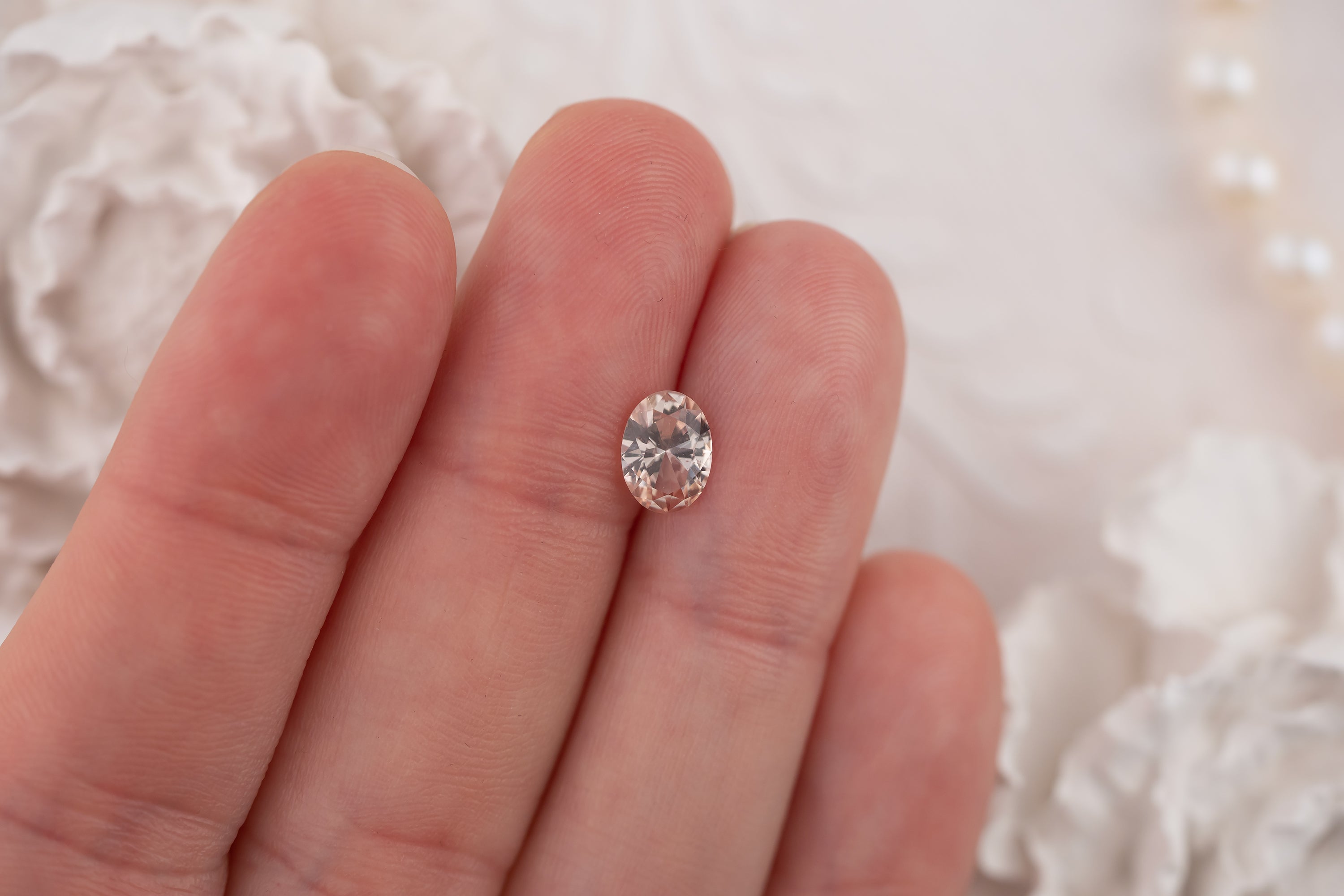 1.23 CT Oval Peachy Apricot Sapphire