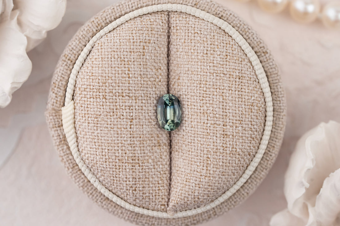0.94 CT Oval Bicolor Teal Sapphire - Lavender Creek Gems 