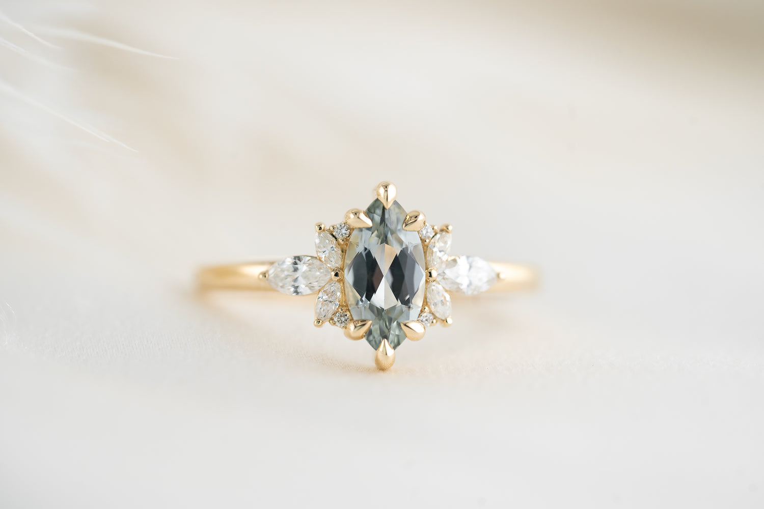 The Flutter Ring | 0.9 CT Marquise Light Blue Montana Sapphire