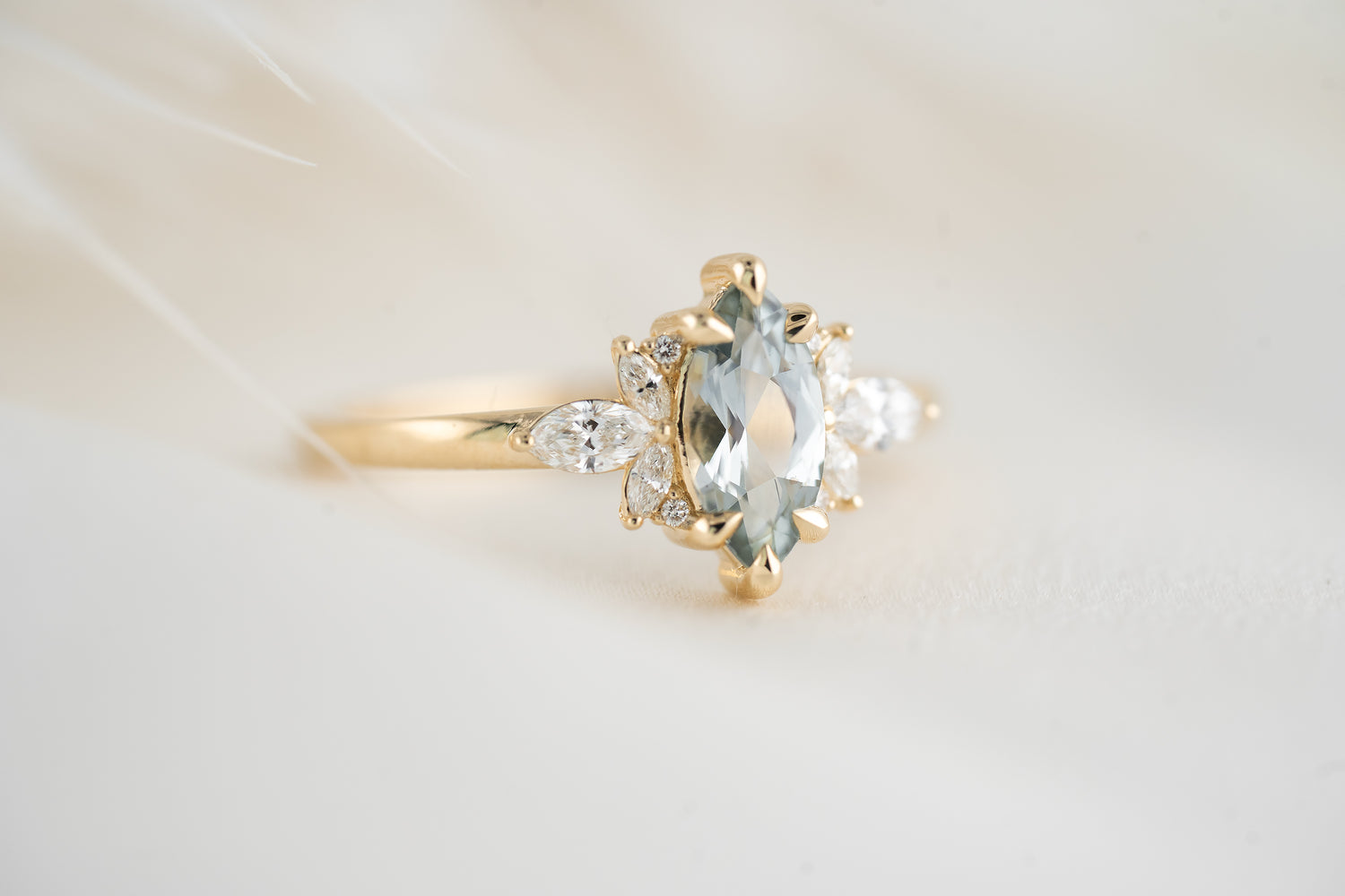 The Flutter Ring | 0.9 CT Marquise Light Blue Montana Sapphire