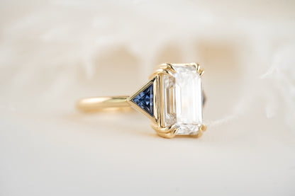 The Zelda Ring | 4.1 CT Emerald Cut Diamond + Royal Blue Sapphire