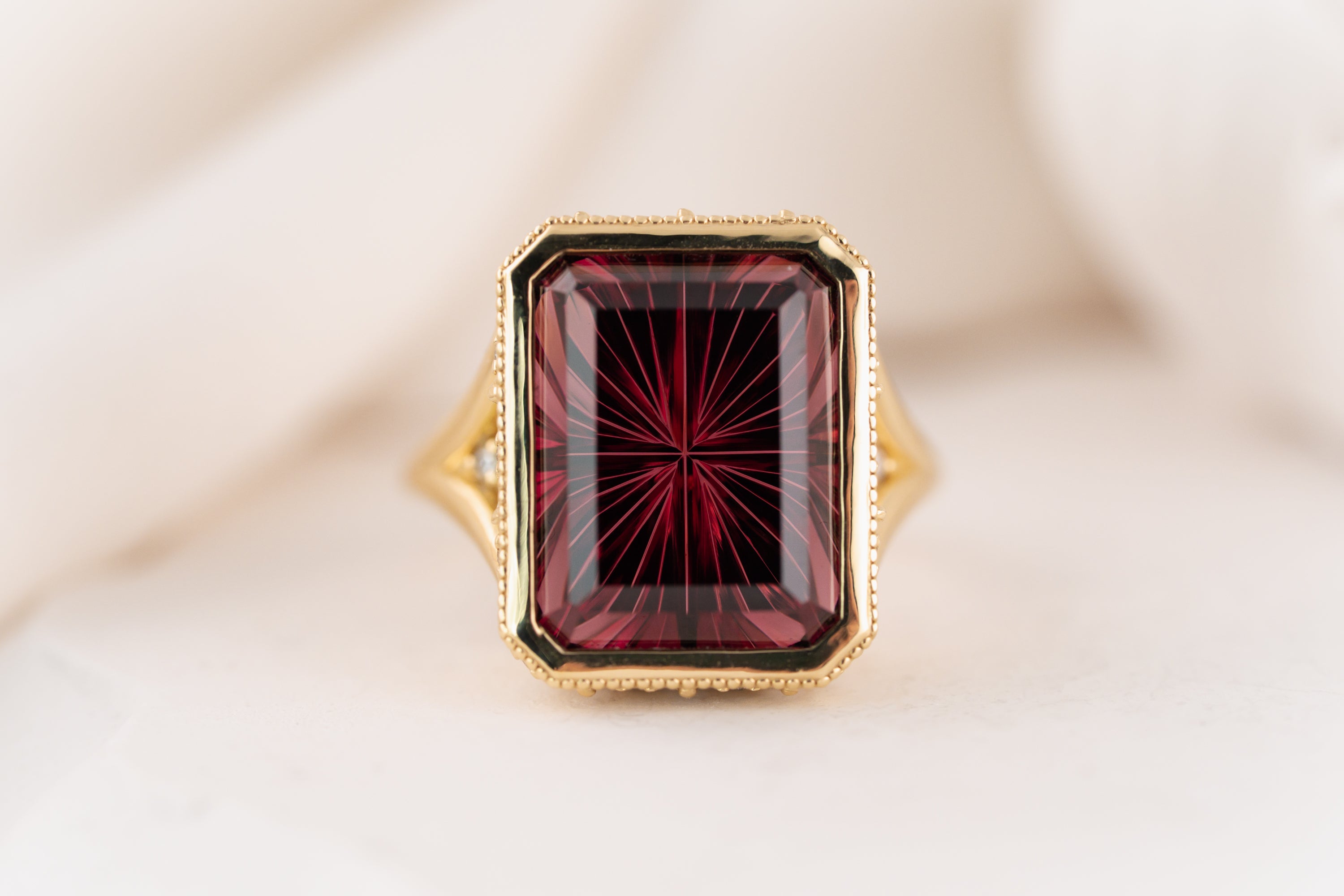 The Yahrin Ring | 14.6 CT Rectangular Starbrite™ Cut Rhodolite Garnet