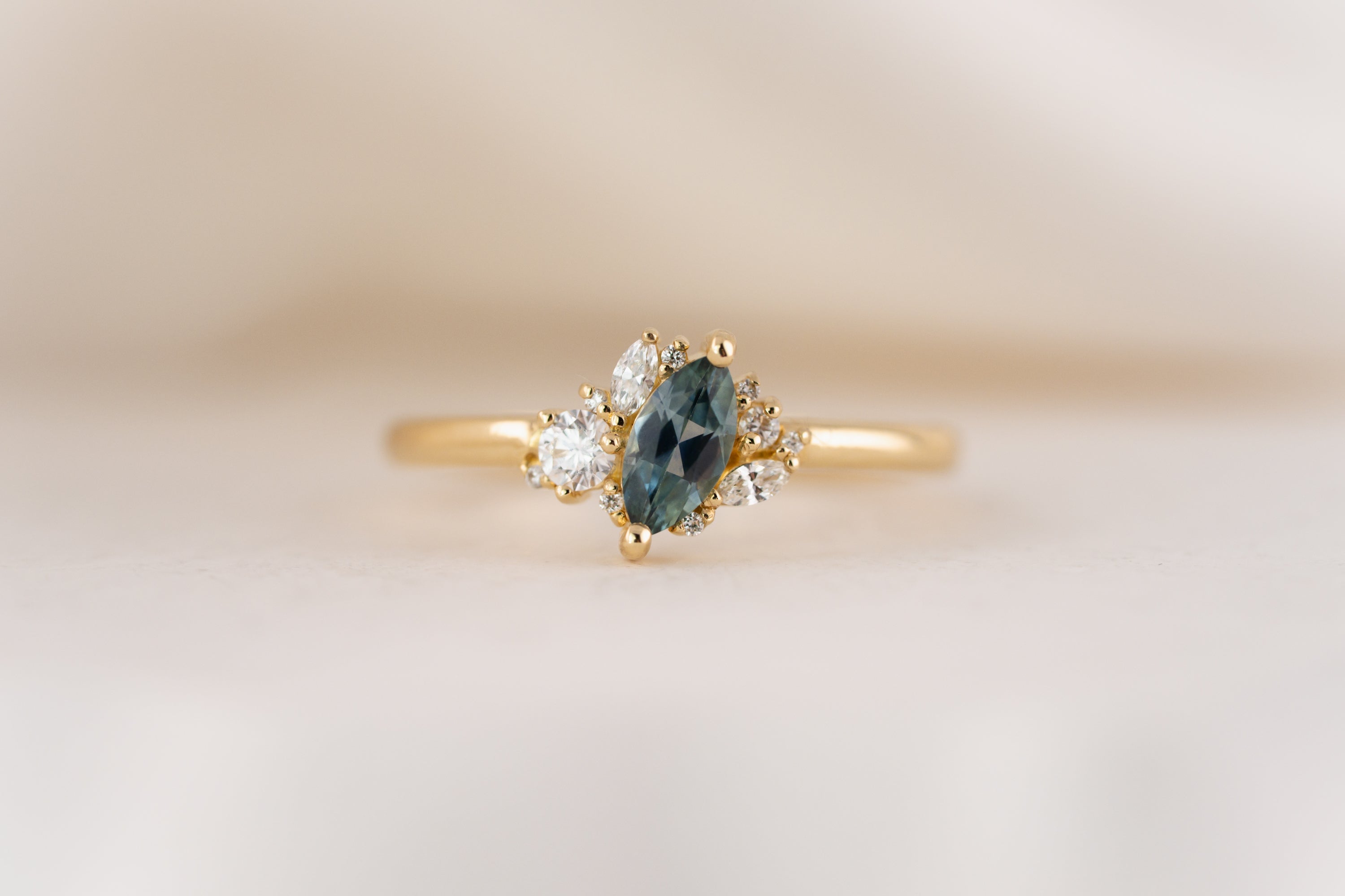 The Cosma Ring | 0.38 CT Marquise Montana Sapphire