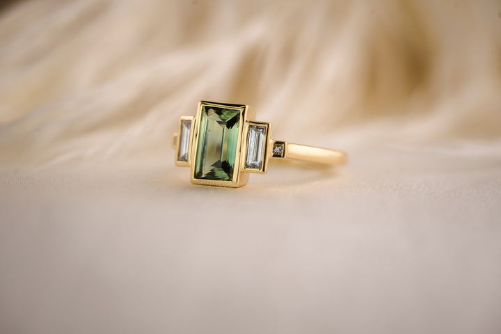 The Lalique 2 CT Green Baguette Sapphire Ring