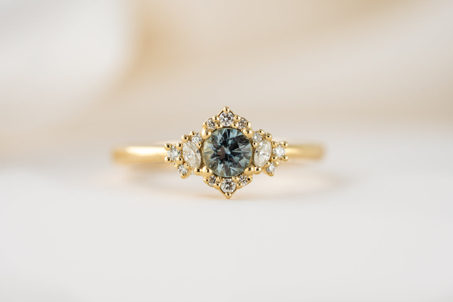 The Naevia Ring | 0.48 CT Round Montana Sapphire