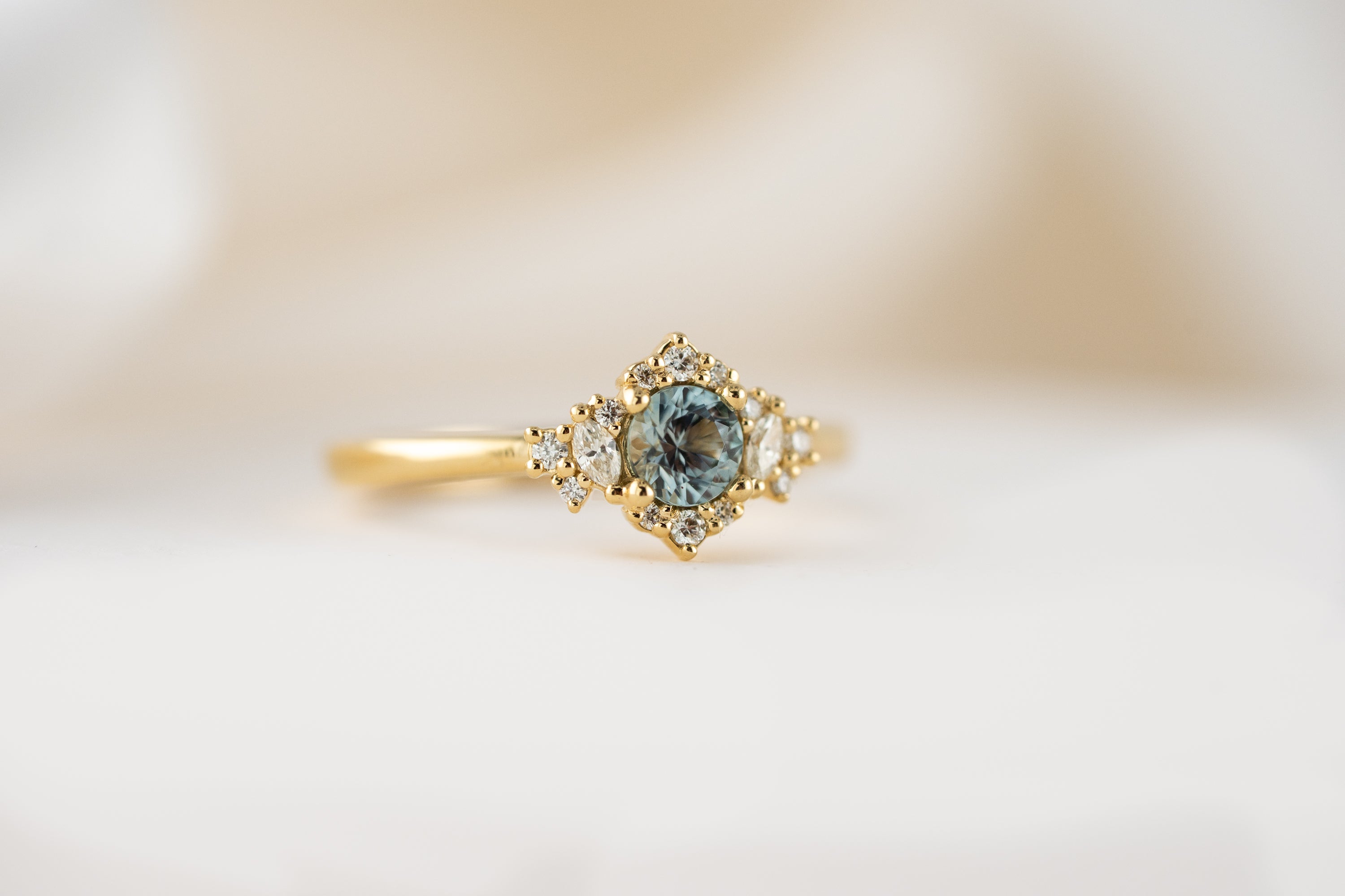 The Naevia Ring | 0.48 CT Round Montana Sapphire