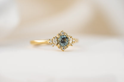The Naevia Ring | 0.48 CT Round Montana Sapphire