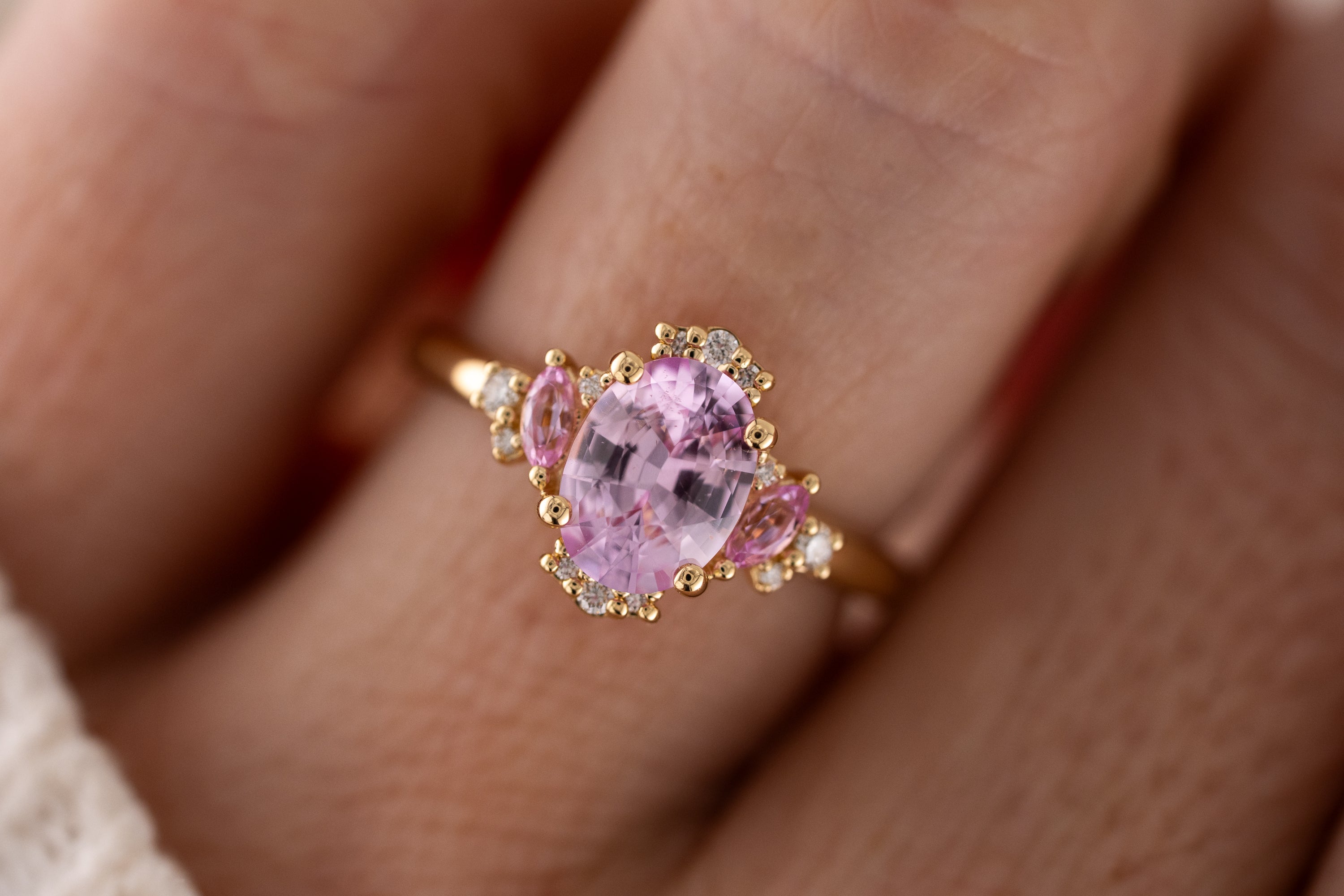 The Naevia Ring | 1.8 CT Oval Light Pink Sapphire + Light Pink Sapphire Accents