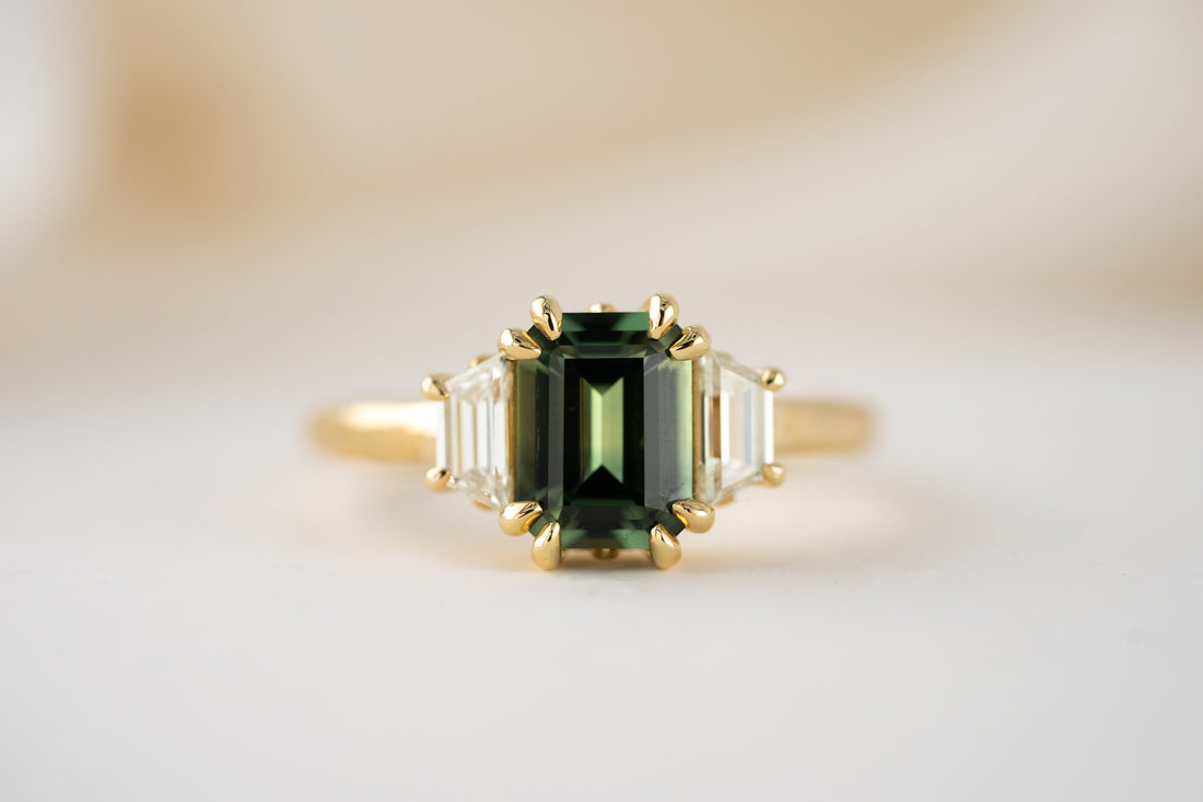 The Tría Ring | 1.85 CT Emerald Cut Teal Green Sapphire