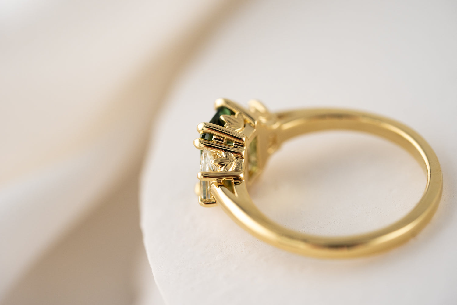 The Tría Ring | 1.85 CT Emerald Cut Teal Green Sapphire