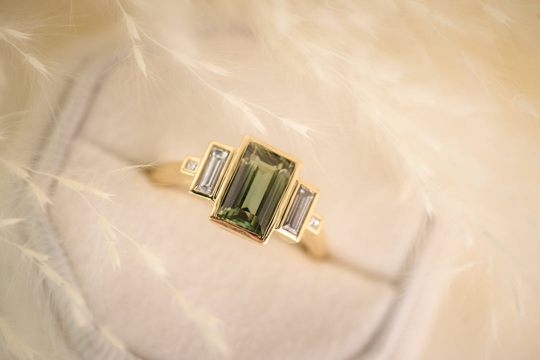 The Lalique 2 CT Green Baguette Sapphire Ring