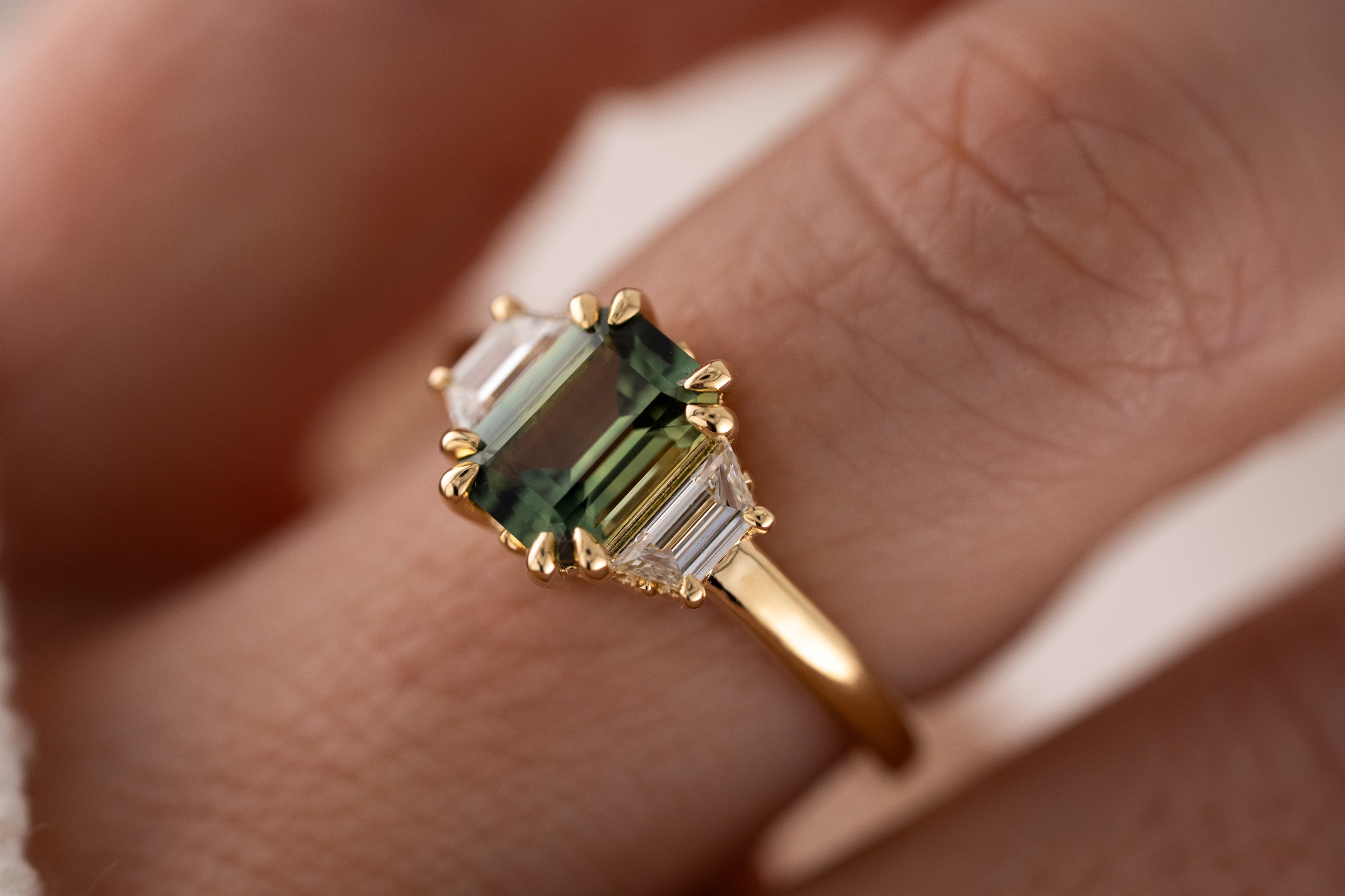 The Tría Ring | 1.85 CT Emerald Cut Teal Green Sapphire
