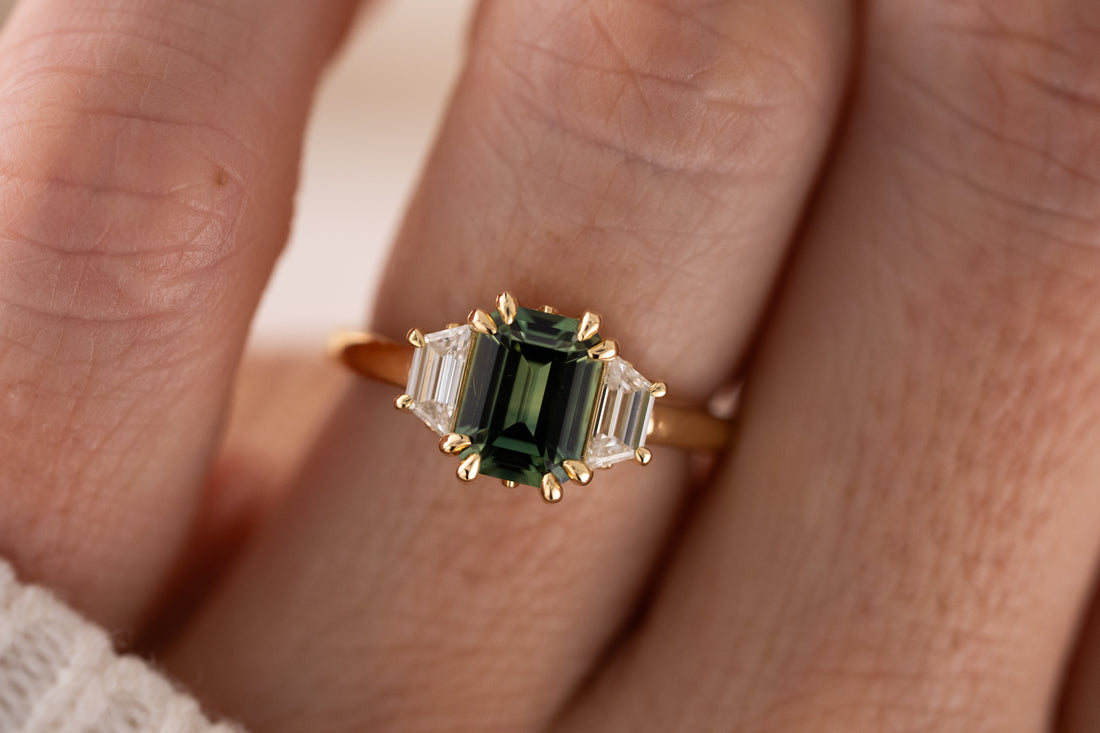 The Tría Ring | 1.85 CT Emerald Cut Teal Green Sapphire