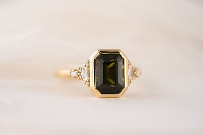 The Bezel Maeve Ring | 3.55 CT Emerald Cut Green Sapphire