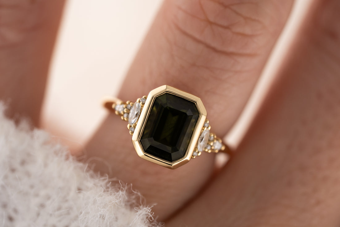 The Bezel Maeve Ring | 3.55 CT Emerald Cut Green Sapphire