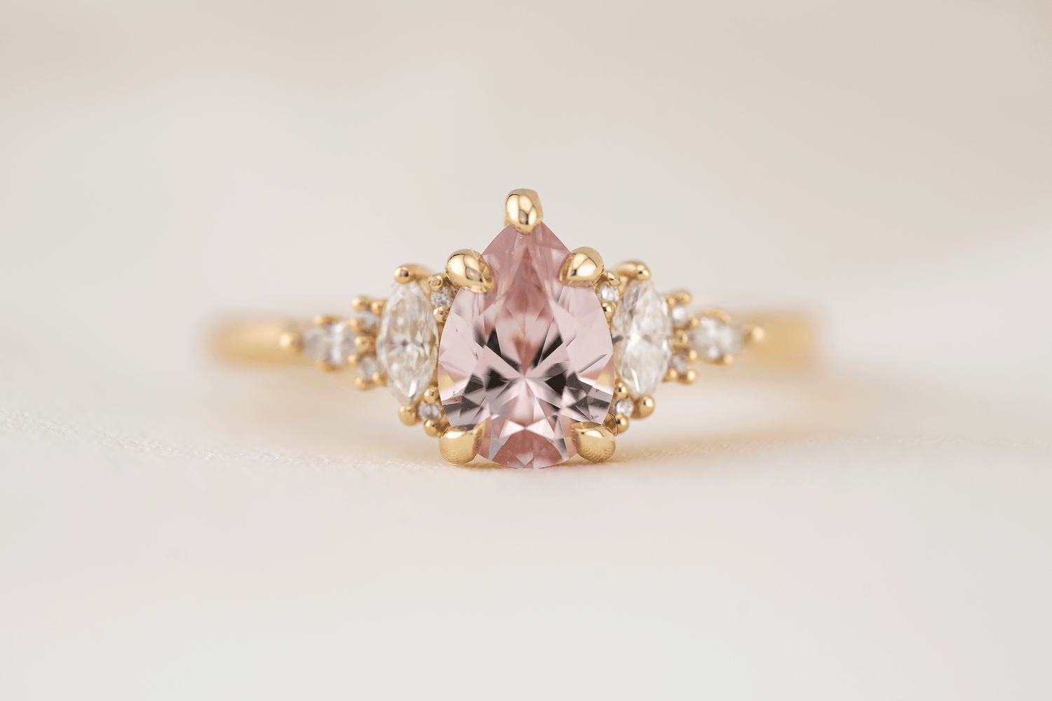The Maeve Ring | 1.1 CT Pear Peachy Pink Sapphire
