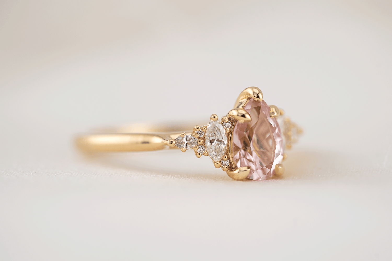 The Maeve Ring | 1.1 CT Pear Peachy Pink Sapphire