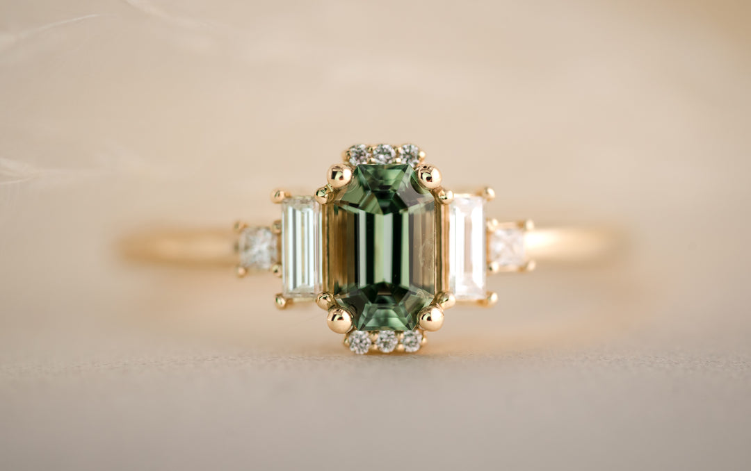 The Sura 0.8 CT Emerald Cut Green Montana Sapphire Ring