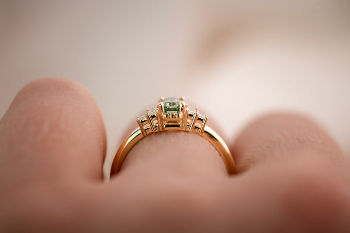 The Sura 0.8 CT Emerald Cut Green Montana Sapphire Ring