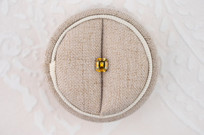 0.81 CT Emerald Cut Bicolor Orange Montana Sapphire