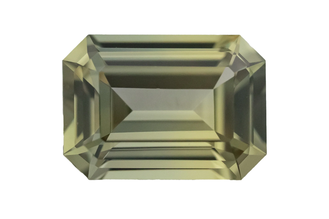 1.82 CT Emerald Cut Pale Bicolor Green Sapphire