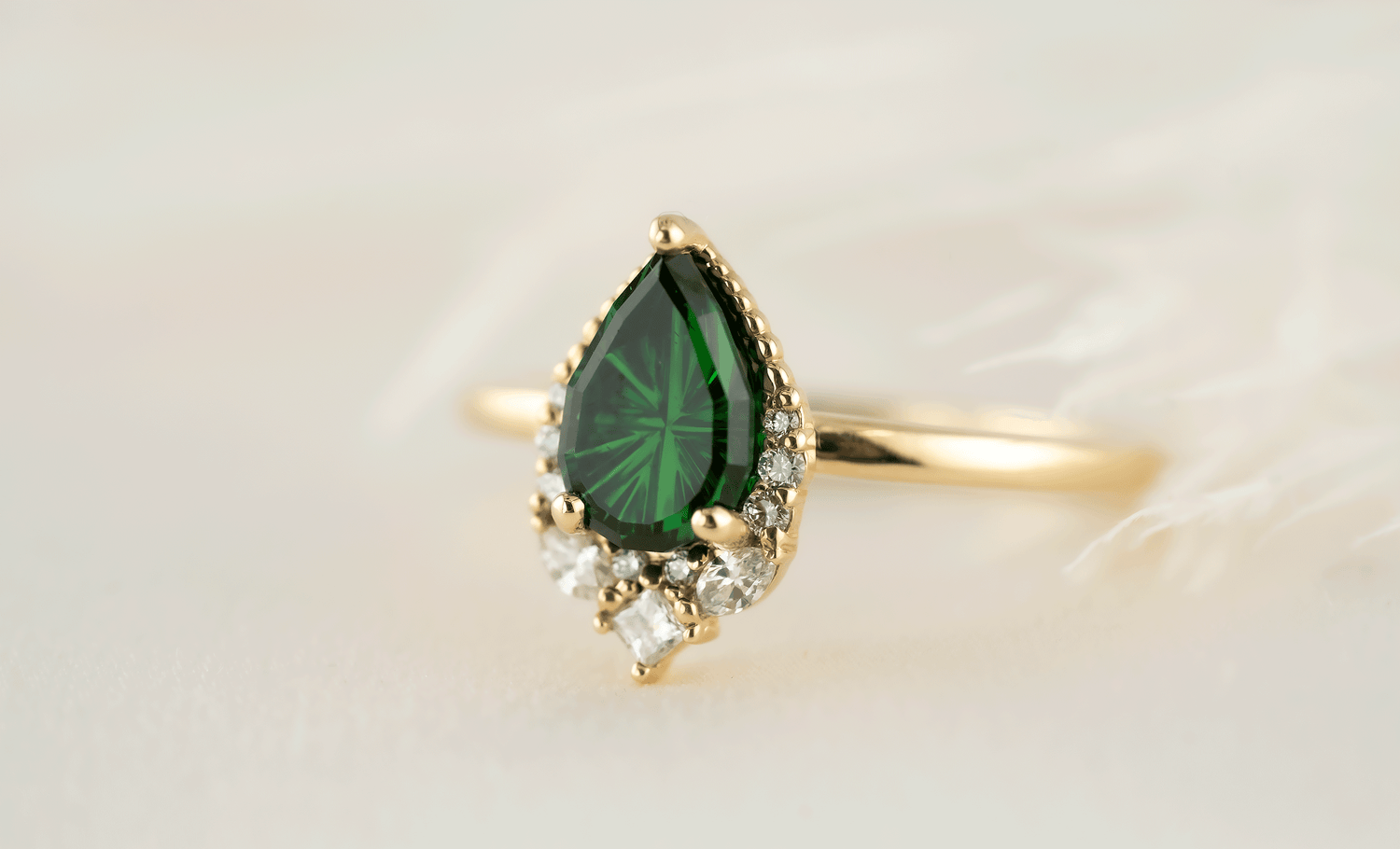 The Charlotte Ring | 1.4 Pear Starbrite™ Tsavorite Garnet