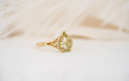 The Serendipity Ring | 1.56 CT Pear Starbrite™ Yellow Green Montana Sapphire