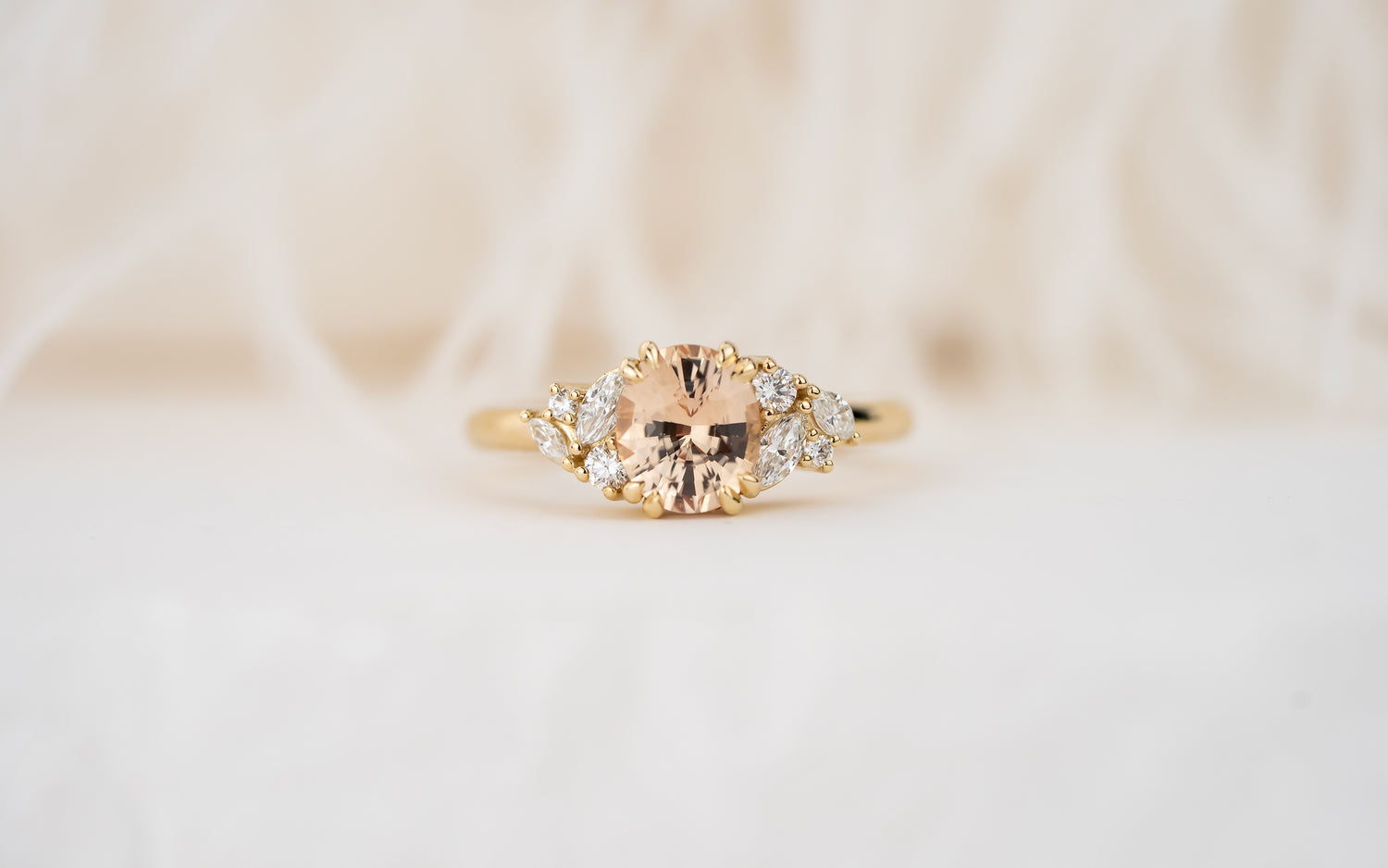 The Laurel Ring | 1.55 CT Oval Peachy Apricot Sapphire